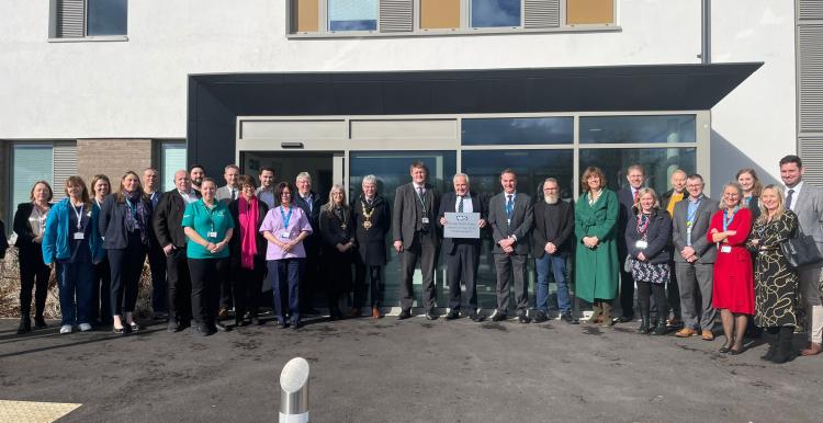 group of people standing outside Devizes Health Centre