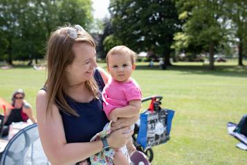 mum holding baby