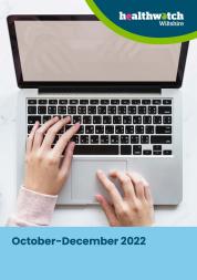 front cover of October-December 2022 quarterly report featuring hands on an open laptop keyboard